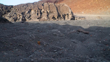 Rocky-Coastline-With-Black-Sandy-Beach-At-Shoreline