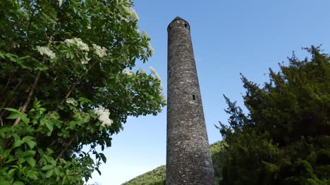 Ireland-Glendalough-Round-Tower-With-Shrub