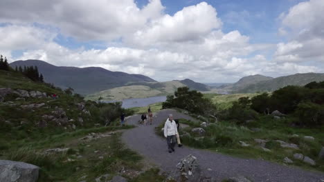 Ireland-Killarney-National-Park-Tourists-On-A-Path-Above-Lough-Leane-