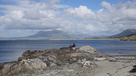 Ireland-County-Galway-Rinvyle-Walking-On-Rock