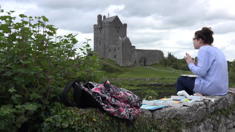 Ireland-Dunguaire-Castle-With-Woman-Painter