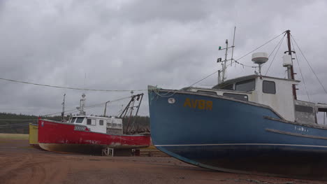 Canada-Nova-Scotia-Blue-Boat-On-Sand