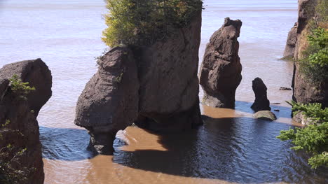 Canada-Tide-Going-Out-Past-Rocks-At-Hopewell-Rocks
