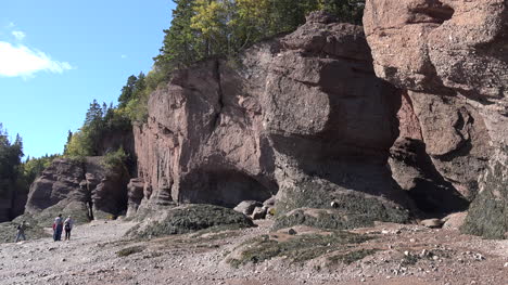 Canada-Tourists-Exploring-Along-Cliffs-At-Hopewell-Rocks