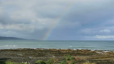 Nueva-Zelanda-Kaka-Point-Rainbow-Sobre-Las-Piscinas-De-Marea