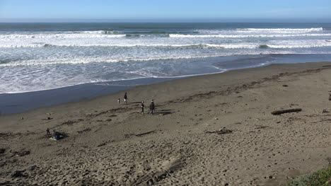 California-Beach-And-Waves-Near-Salmon-Creek-With-People-Walking