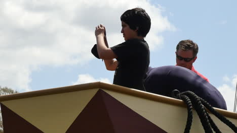 Virginia-Jamestown-Boy-With-Camera-On-Ship-Zoom