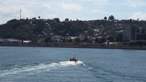 Chile-Puerto-Montt-Tender-Leaves-With-Wake