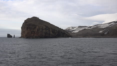 Antarctica-Large-Rock-And-Sea-Stacks-Deception-Island-Zoom-In
