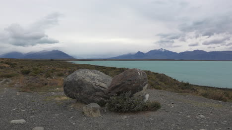 Argentina-Boulders-Frame-View-Of-Lake-Argentino