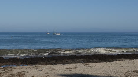 California-Santa-Cruz-Beach-With-Boats-In-Bay