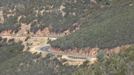 California-Zooms-Out-From-Road-In-Sierra-Foothills
