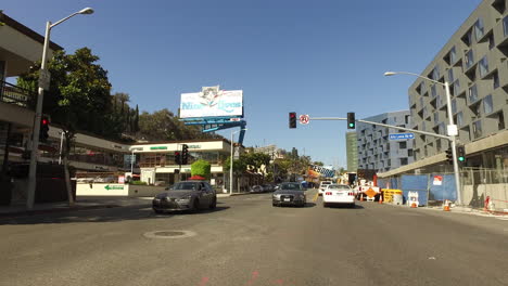 Los-Angeles-Driving-Past-A-Maintenance-Truck