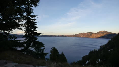 Oregon-Crater-Lake-View-With-Fir-Trees-In-Evening
