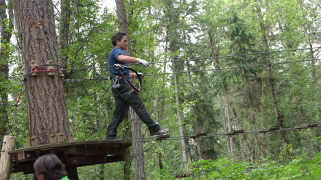 Washington-Man-In-Blue-Shirt-Walks-To-Tree