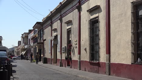 Mexico-Tlaquepaque-Red-And-Yellow-Building-By-Street