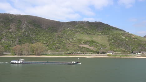 Germany-Barge-On-Rhine-With-Hills-And-Vineyards