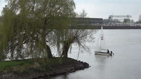 Netherlands-Sailboat-On-De-Lek-Zoom-In