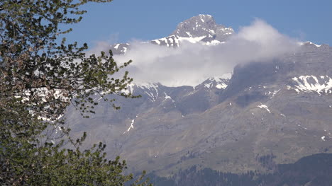 France-Alpine-Peak-Aravis-Range-And-Spring-Leaves-Zooms-Out