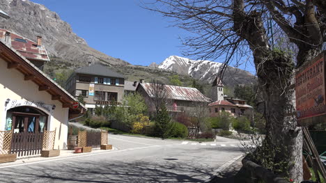 France-Meyronnes-Church-And-Snowcapped-Peak