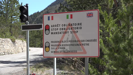 France-Sign-By-A-Traffic-Light-On-The-Col-De-Larche-Road
