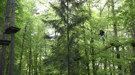 Austria-woman-on-zip-line-bridge