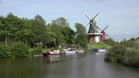 Germany-Greetsiel-windmills-and-canal-zoom-in