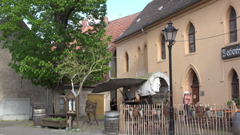 Germany-Tangermunde-man-with-camera-and-building