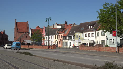 Germany-Wismar-traffic-on-street-by-waterfront