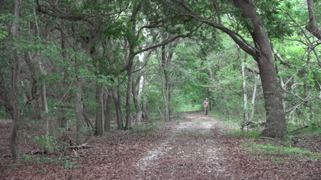 Louisiana-man-on-path-in-woods