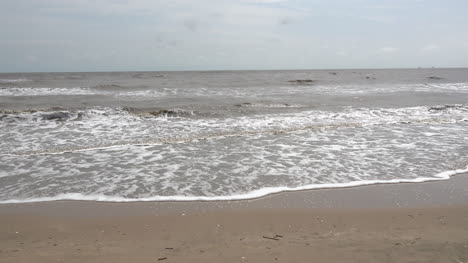 Louisiana-waves-on-sandy-beach