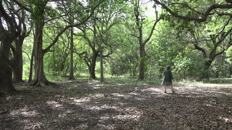 Louisiana-woman-walking-in-woods