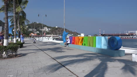 Mexico-Manzanillo-colorful-letters-and-tourists