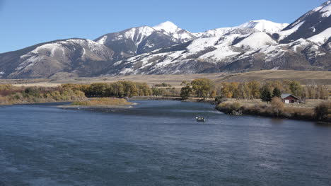Montana-drift-boat-on-river-by-mountains