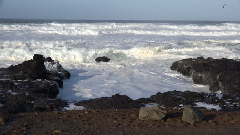 Oregon-wave-hits-small-rock-then-crashes-on-shore