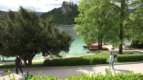 Slovania-backpacker-walks-by-Lake-Bled