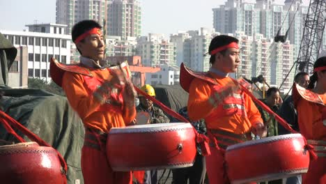 Guangzhou-Männer-Trommeln