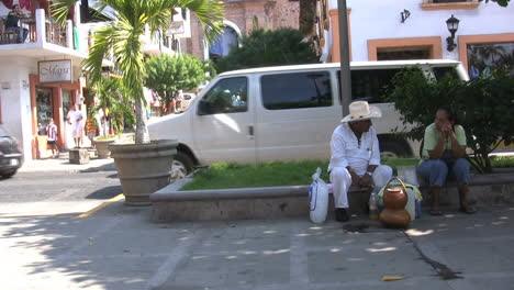 Mexico-Puerto-Vallarta-men-by-curb