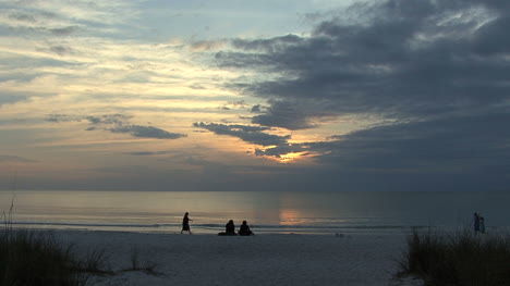 Florida-People-walk-by-couple-on-beach