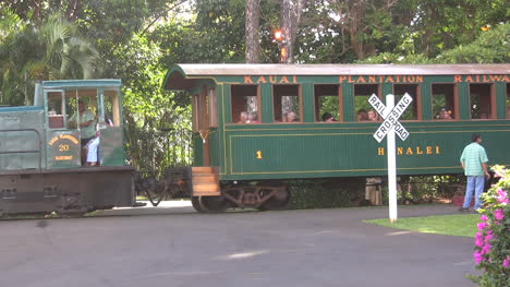 Kauai-plantation-train-goes-by-a-rail-crossing-sign