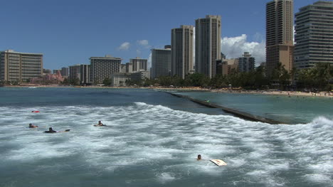 Waikiki-surfers-and-high-rise-hotels