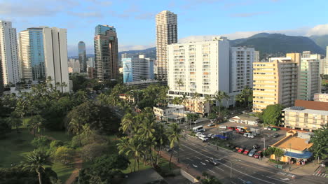 Honolulu-skyline-and-traffic-on-a-street