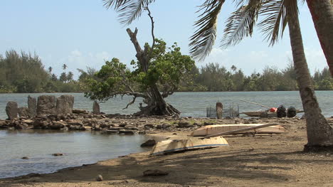 Huahine-sacred-site-and-beached-boats