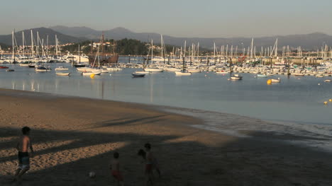 Spain-Galicia-Baiona-harbor-playing