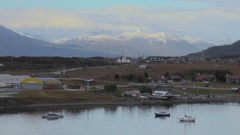 Argentina-Ushuaia-harbor-boats-and-mountains