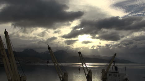 Argentina-Ushuaia-harbor-loading-cranes-and-sky-timelapse