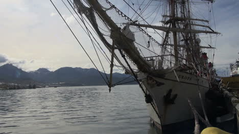 Argentina-Ushuaia-sailing-ship-bow-rigging-and-mountains