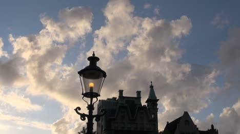 Amsterdam-cloud-and-street-light-by-building