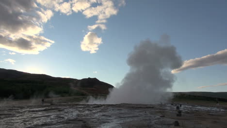 Iceland-Geysir-Strokkur-erupting-at-sunset