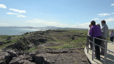 Iceland-Pingvellir-tourists-viewing-lake